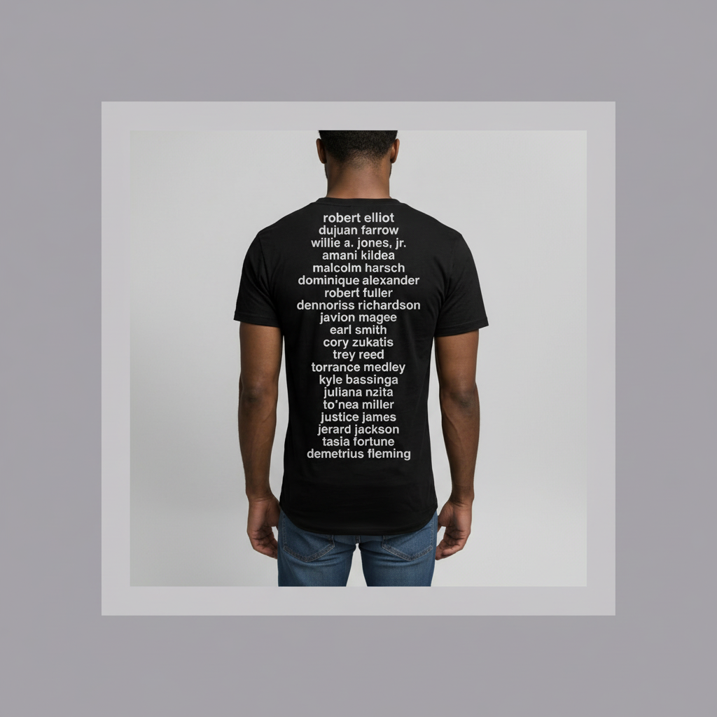 Back view of the BPDLT2 black T-shirt with memorial names, including Robert Elliot, framed in muted lavender